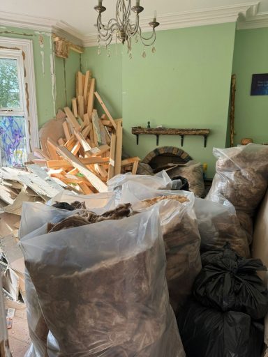 House Clearance - Before Cluttered living room before house clearance